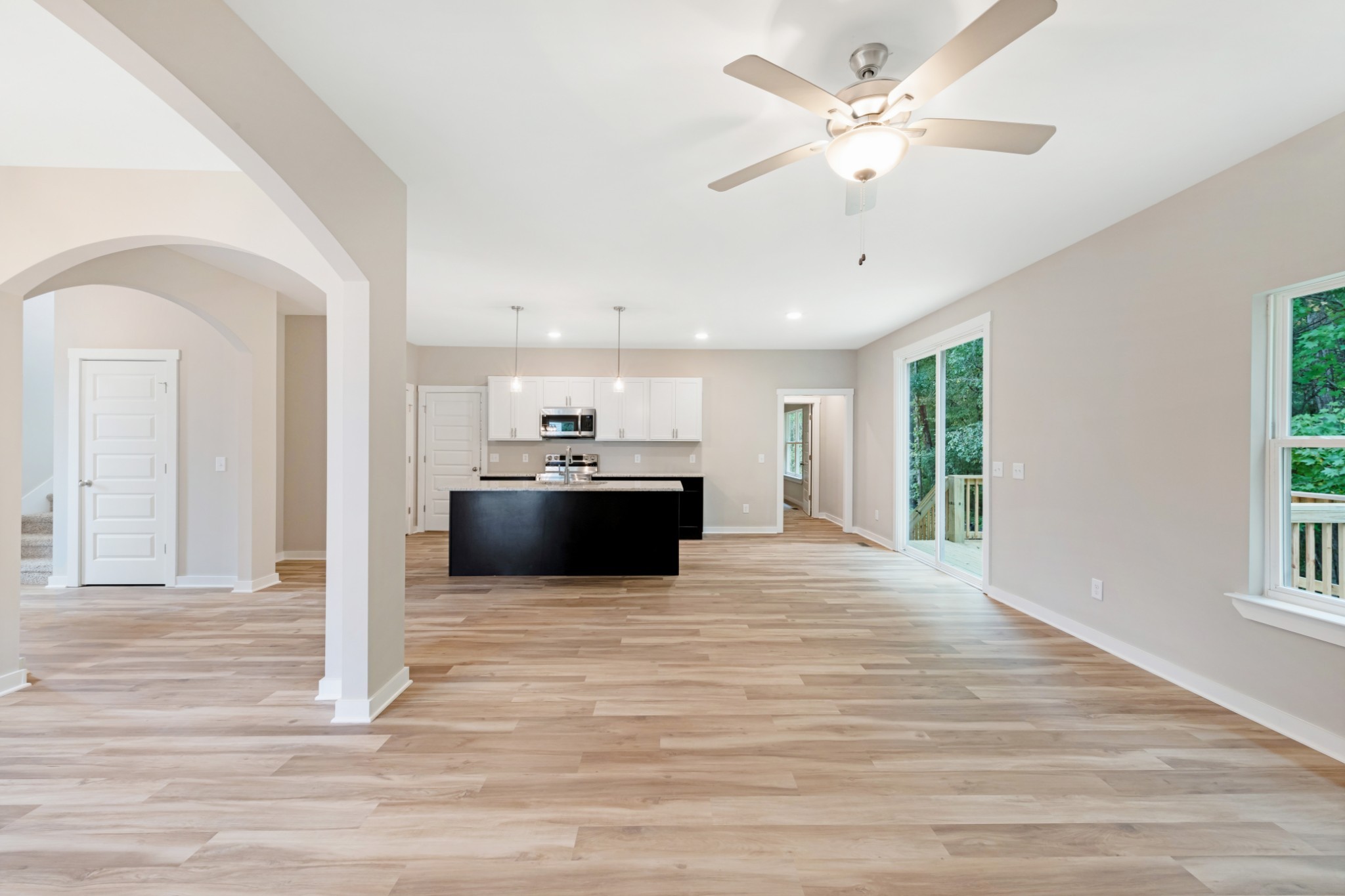 2074 Morgan Court Springfield, TN 37172 - Photo 9 of 20 a view of kitchen and kitchen with furniture wooden floor and window
