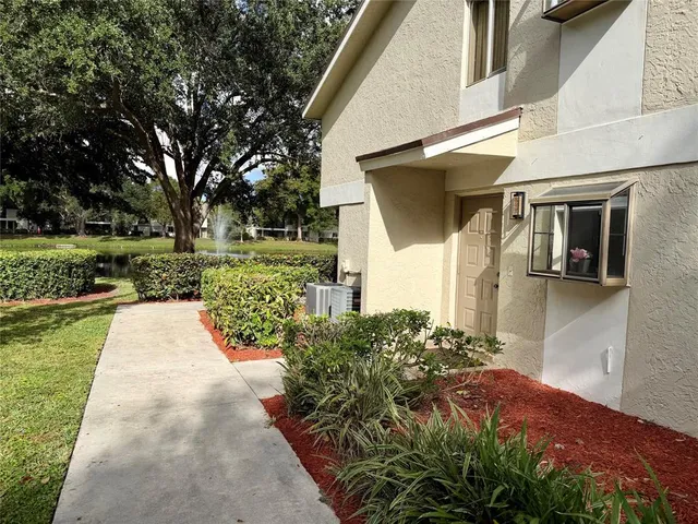 a view of a back yard of the house