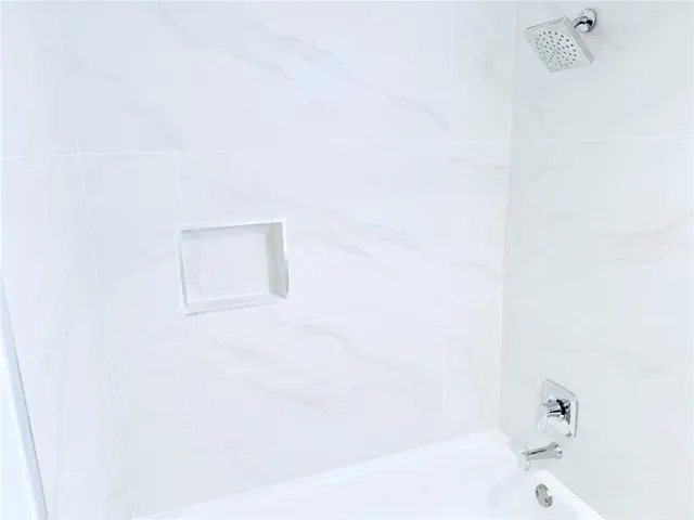a bathroom with a bathtub