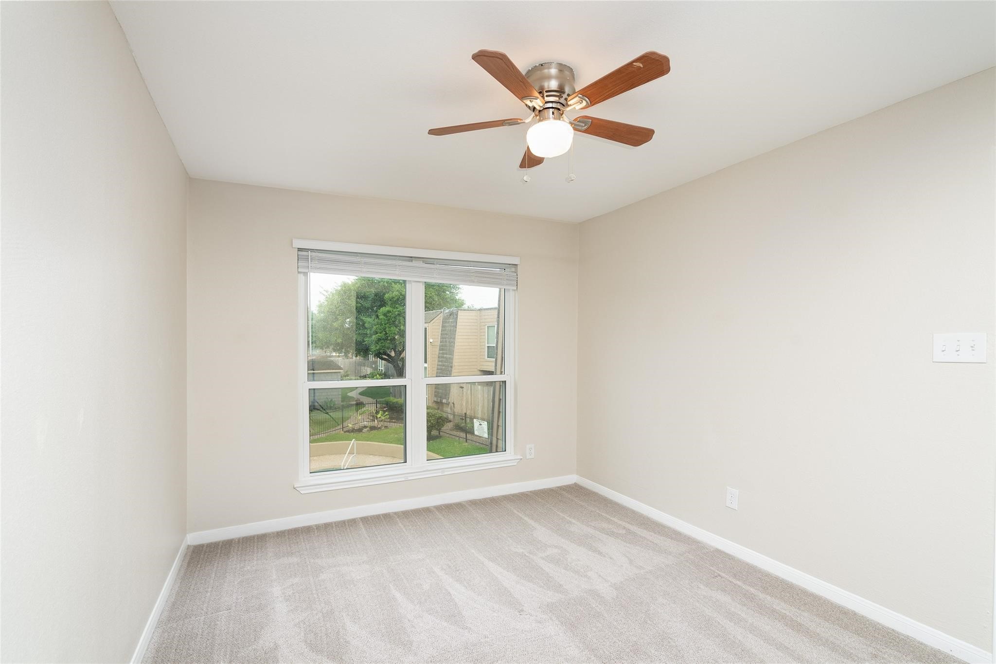 16120 Stuebner Airline Road, Unit 501 Spring, TX 77379 - Photo 21 of 23 an empty room with window