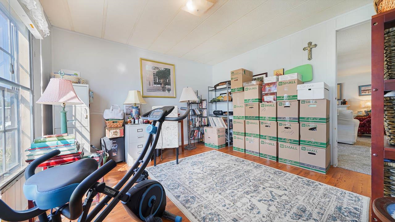 3251 E Road, Unit 100 Clifton, CO 81520 - Photo 11 of 22 a view of a room with gym equipment