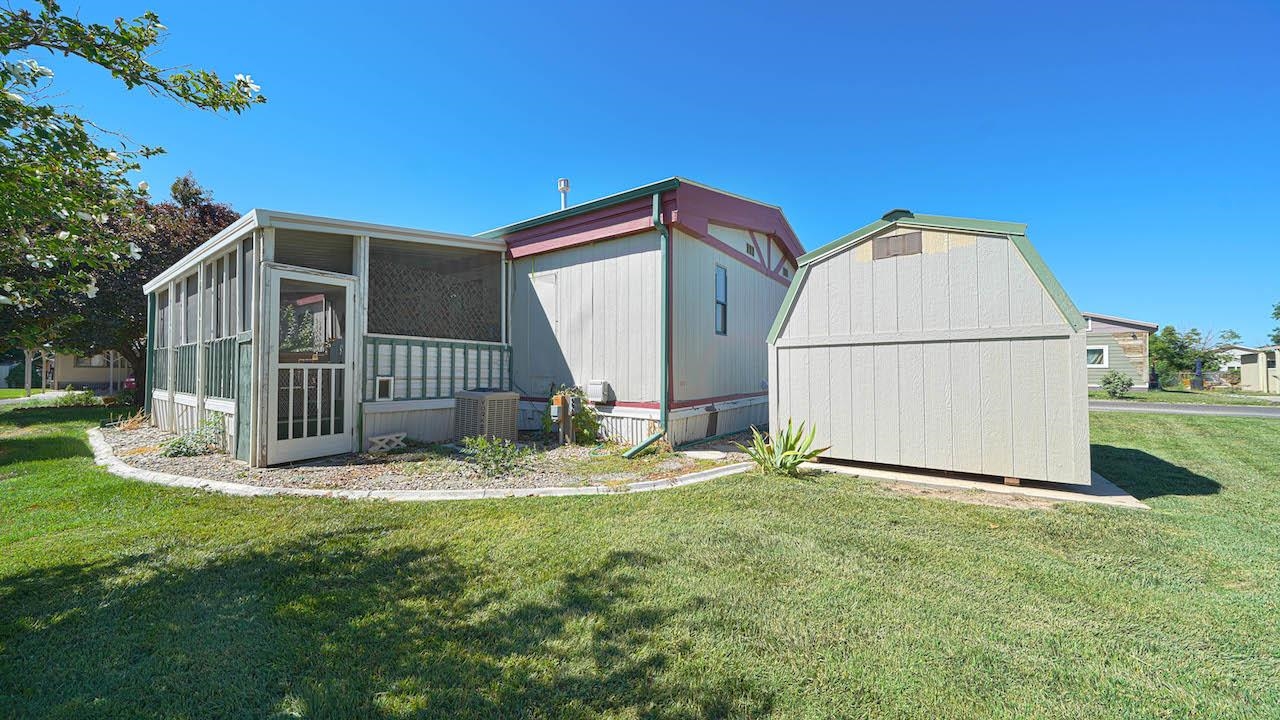 3251 E Road, Unit 100 Clifton, CO 81520 - Photo 19 of 22 a view of backyard with cabin