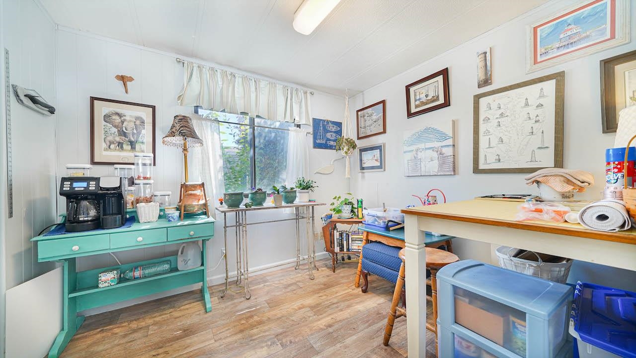 3251 E Road, Unit 100 Clifton, CO 81520 - Photo 9 of 22 a room with furniture a rug and a window