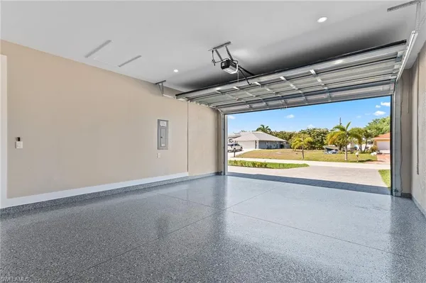 a view of an empty room and a window