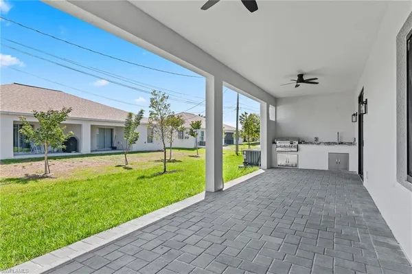 a view of a porch and garden
