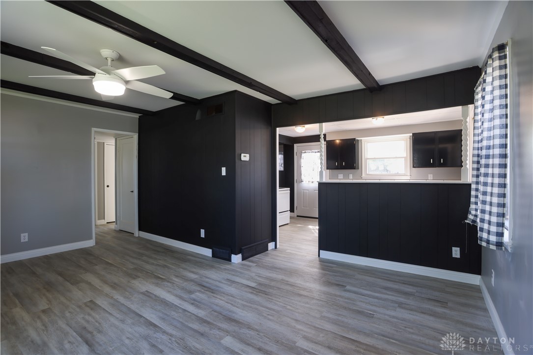 1627 Joselin Road Dayton, OH 45432 - Photo 7 of 28 This inviting interior features elegant exposed beams, durable flooring, and an open layout.