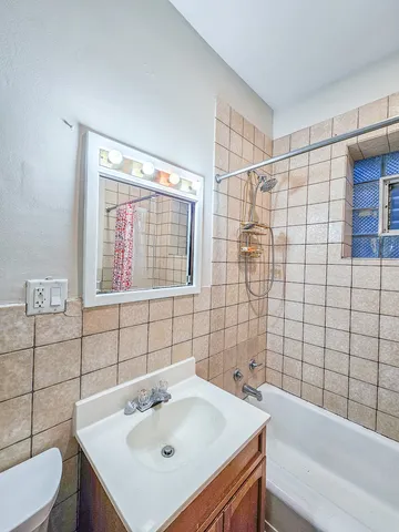 a bathroom with a sink and a bathtub