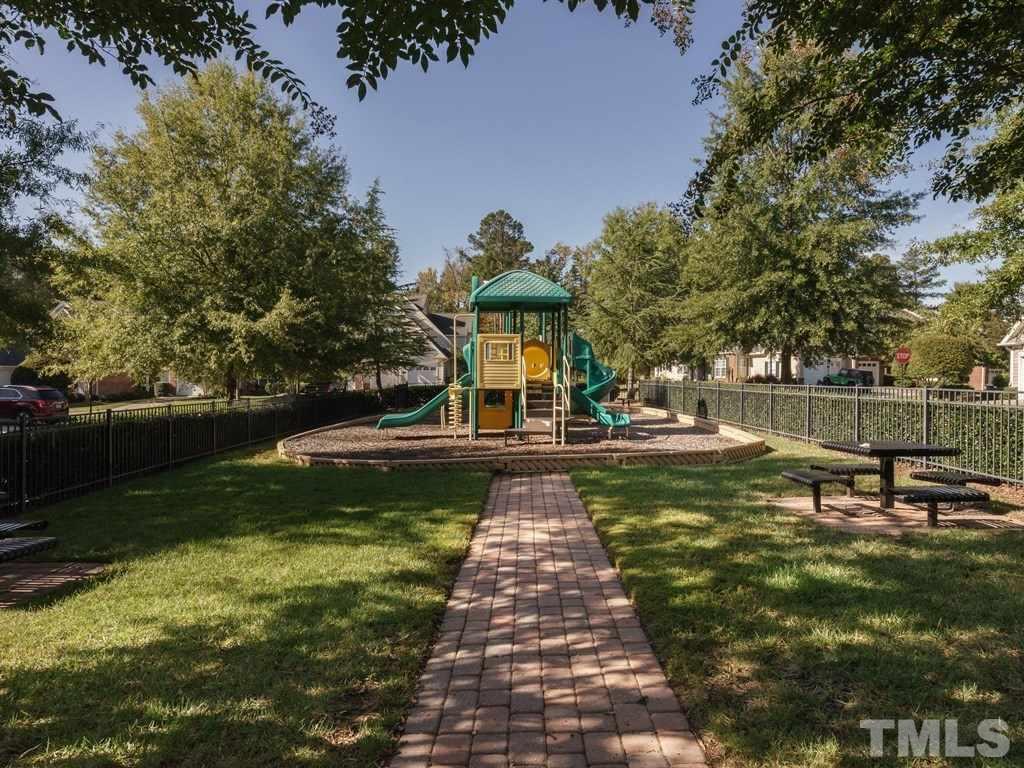 9523 Vira Drive Raleigh, NC 27617 - Photo 23 of 25 a view of a park with large trees