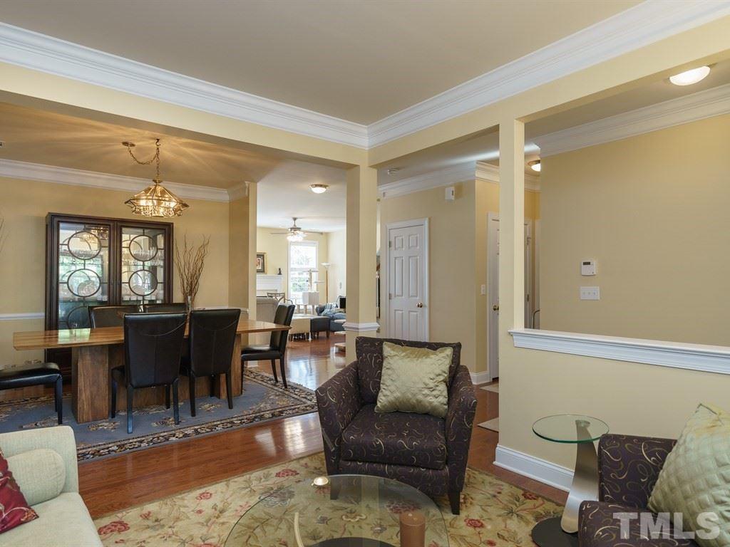 9523 Vira Drive Raleigh, NC 27617 - Photo 4 of 25 a living room with furniture dining area and a window