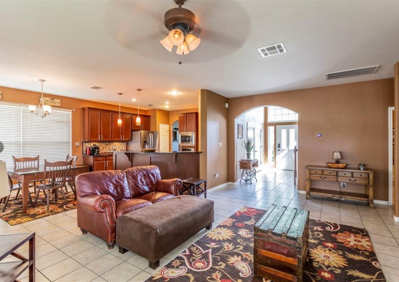 1100 Antelope Ridge Cedar Park, TX 78613 - Photo 4 of 24 a living room with furniture a couch and chandelier