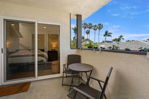 a view of entryway with bathroom and front door