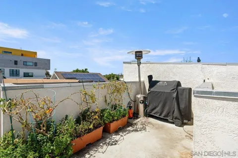 a view of a terrace with chairs