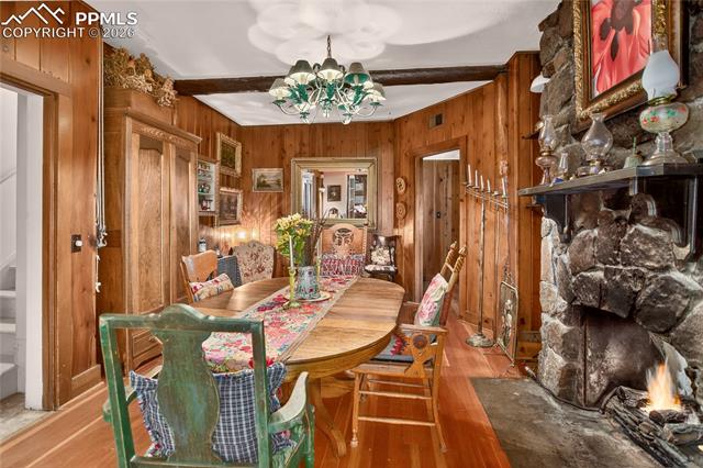 5975 Wellington Road Cascade, CO 80809 - Photo 13 of 32 Handcrafted rock & moss gas fireplac