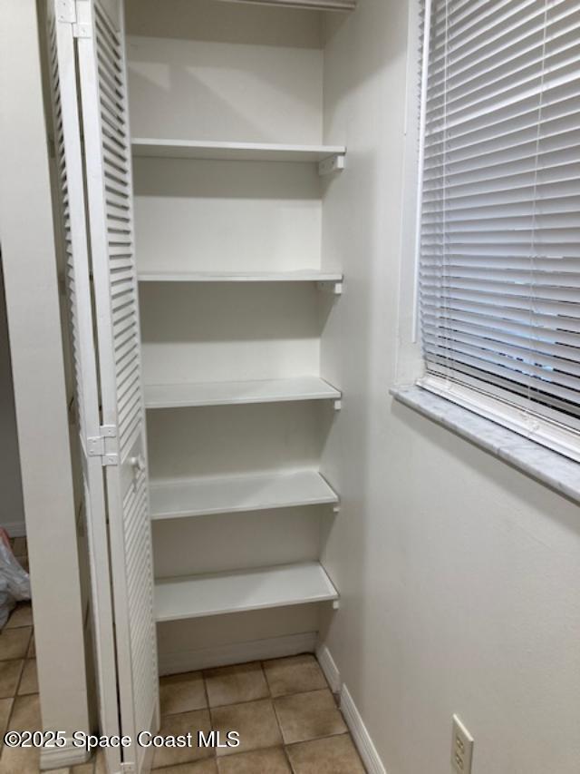 1720 Murrell Road, Unit 207 Rockledge, FL 32955 - Photo 6 of 18 Kitchen pantry