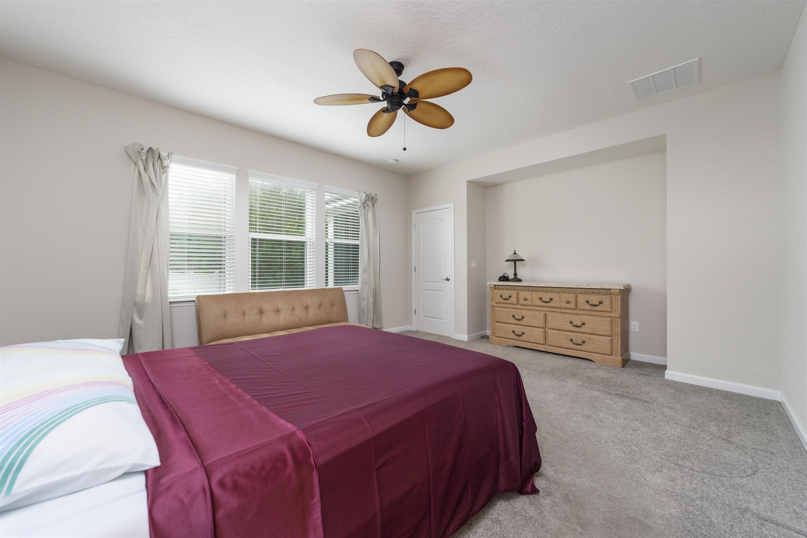 850 East Watson Road St. Augustine, FL 32086 - Photo 21 of 38 a bed room with a bed and a window