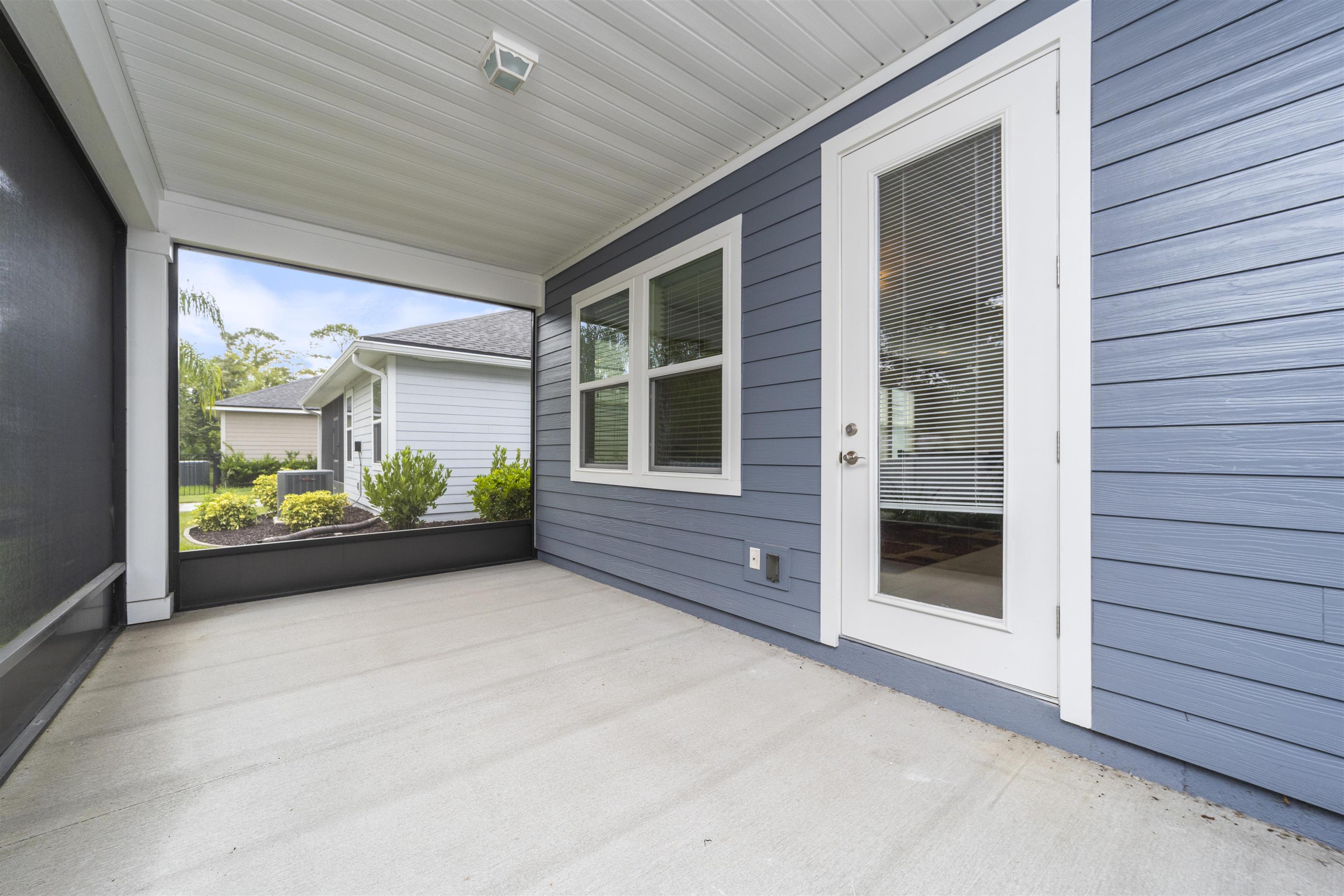 850 East Watson Road St. Augustine, FL 32086 - Photo 24 of 38 a view of front door and porch