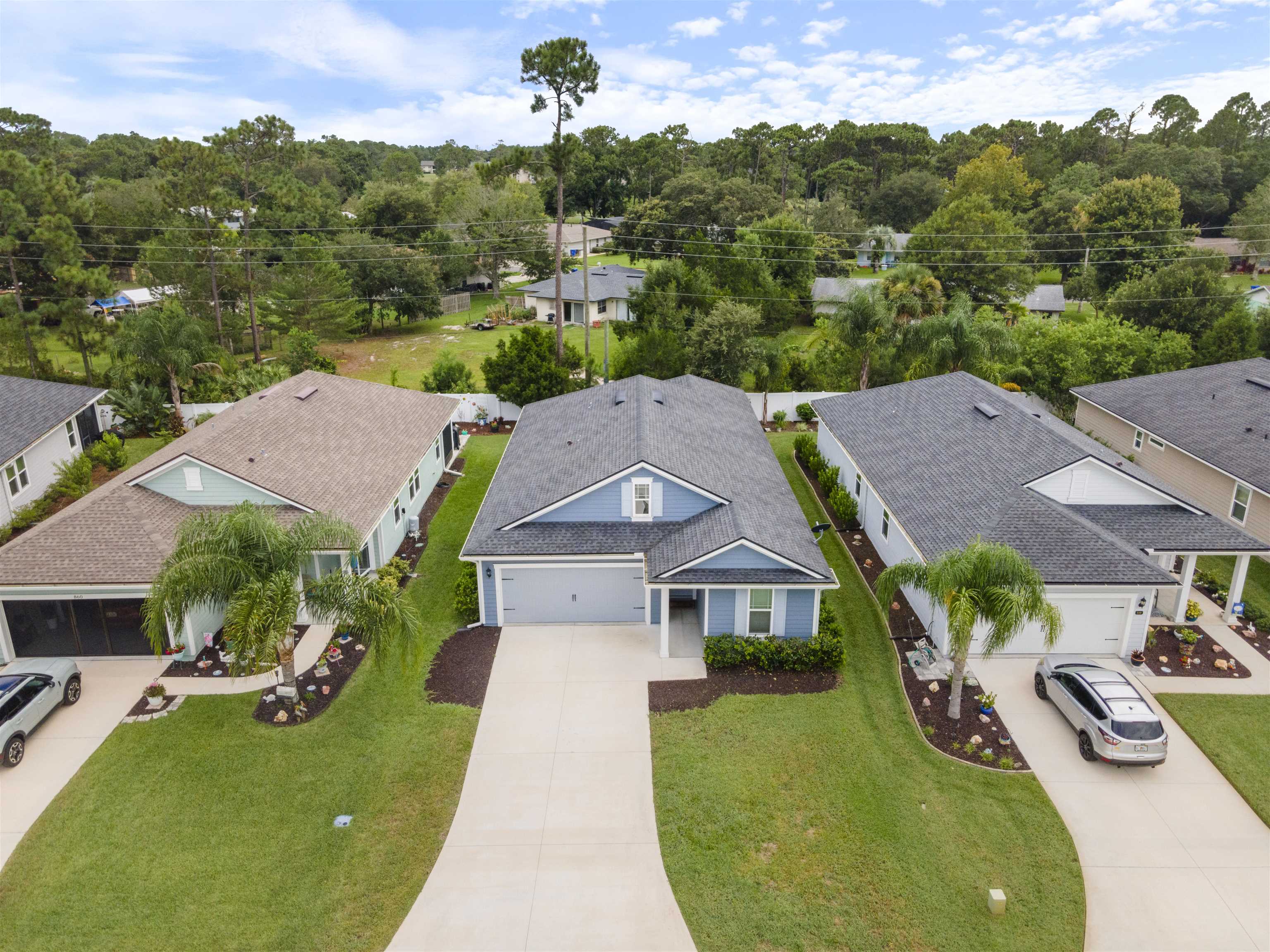 850 East Watson Road St. Augustine, FL 32086 - Photo 3 of 38 an aerial view of a house with garden