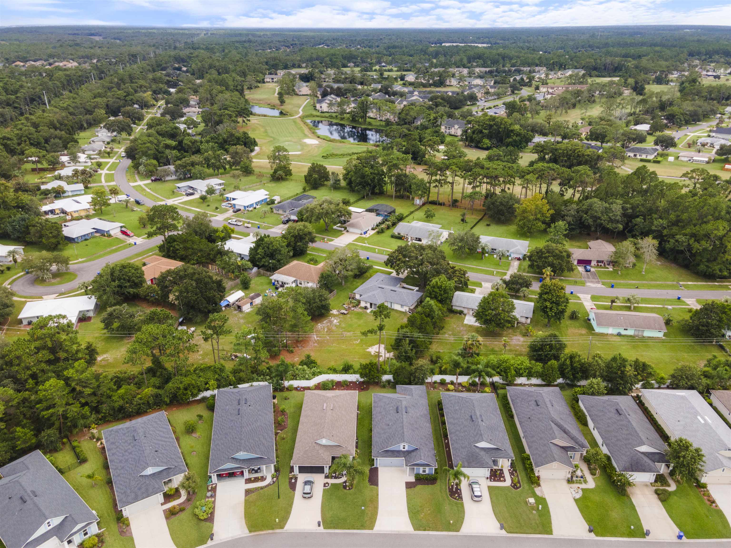 850 East Watson Road St. Augustine, FL 32086 - Photo 32 of 38 an aerial view of residential houses with outdoor space and street view