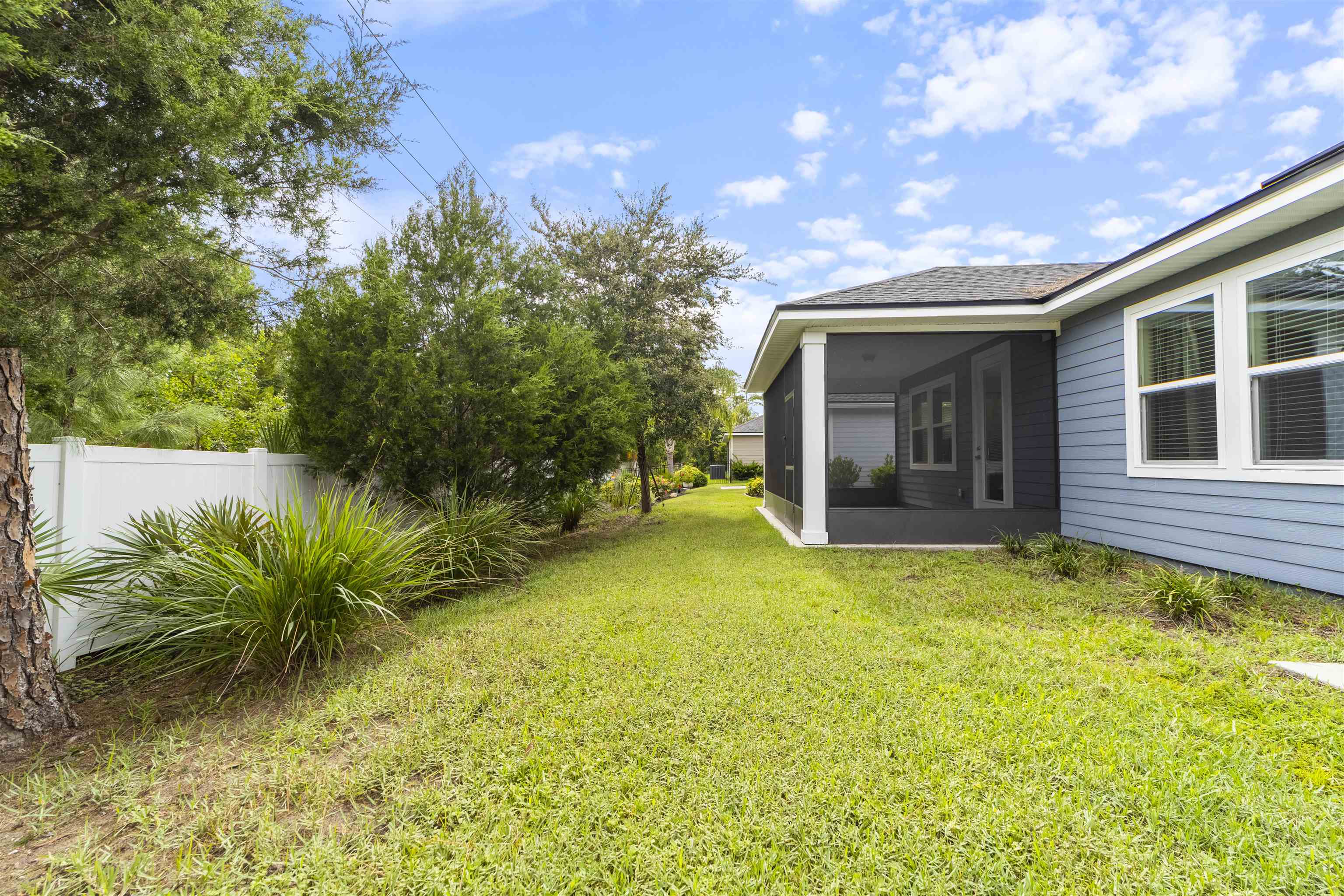 850 East Watson Road St. Augustine, FL 32086 - Photo 35 of 38 a view of a house with a yard