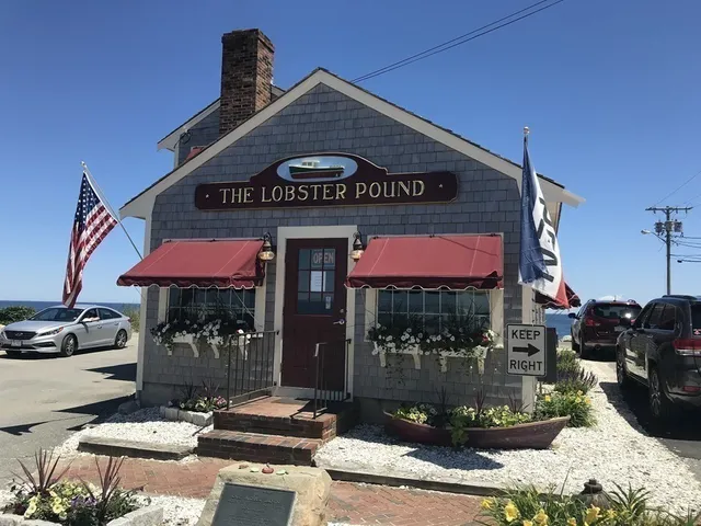 a view of a cafe with sitting area