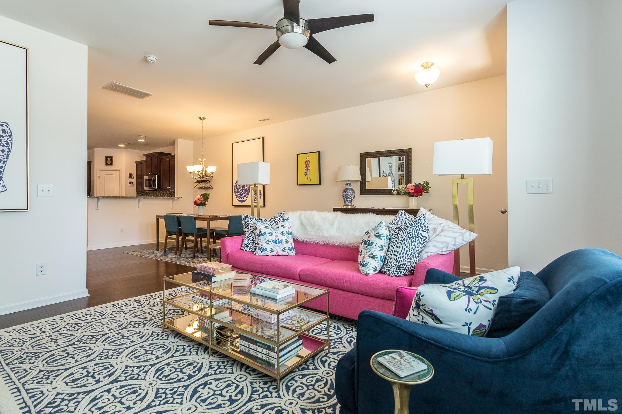 1308 Regulator Street Raleigh, NC 27603 - Photo 4 of 17 a living room with furniture and a wooden floor
