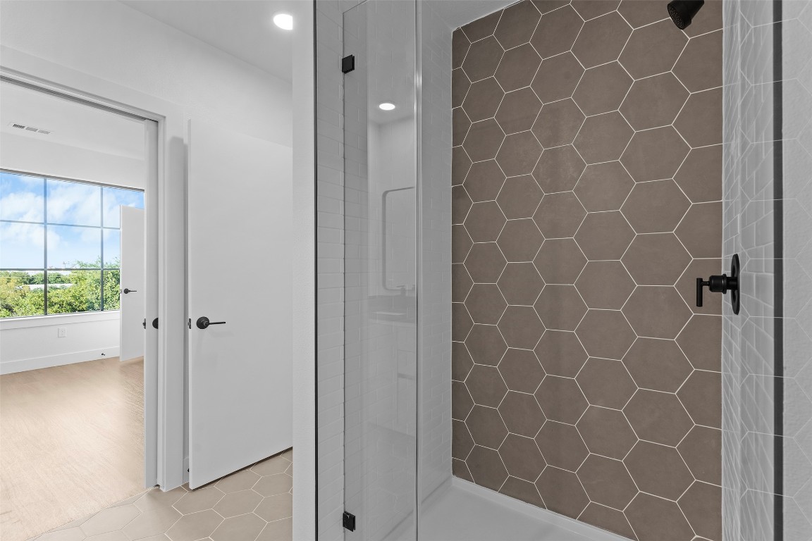 4315 South Congress Avenue, Unit 433 Austin, TX 78745 - Photo 11 of 23 a bathroom with a shower and a sink