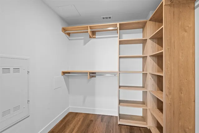 a view of an empty walk in closet