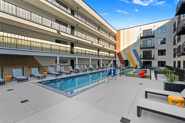 a view of a building with sitting area