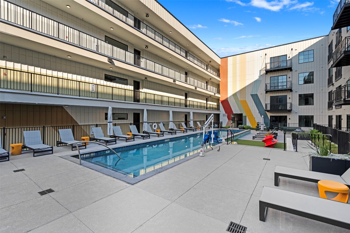 4315 South Congress Avenue, Unit 433 Austin, TX 78745 - Photo 16 of 23 a view of a building with sitting area