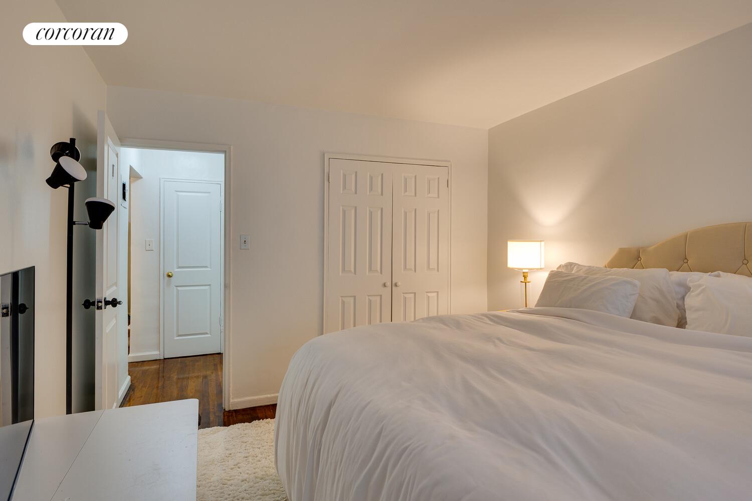 310 Lenox Road, Unit 5U Brooklyn, NY 11226 - Photo 10 of 14 a bedroom with a bed and a walk in closet