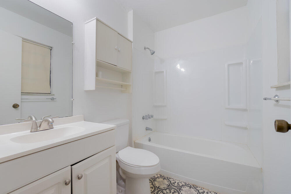 1564 West 20th Street Riviera Beach, FL 33404 - Photo 13 of 23 a bathroom with a sink toilet and shower
