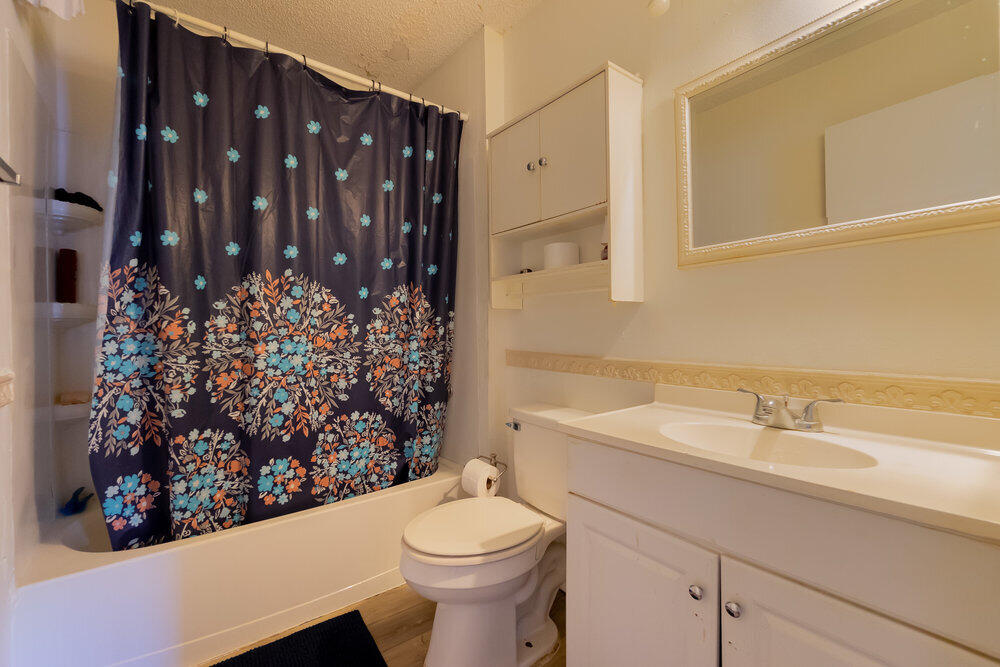 1564 West 20th Street Riviera Beach, FL 33404 - Photo 15 of 23 a bathroom with a sink toilet and shower