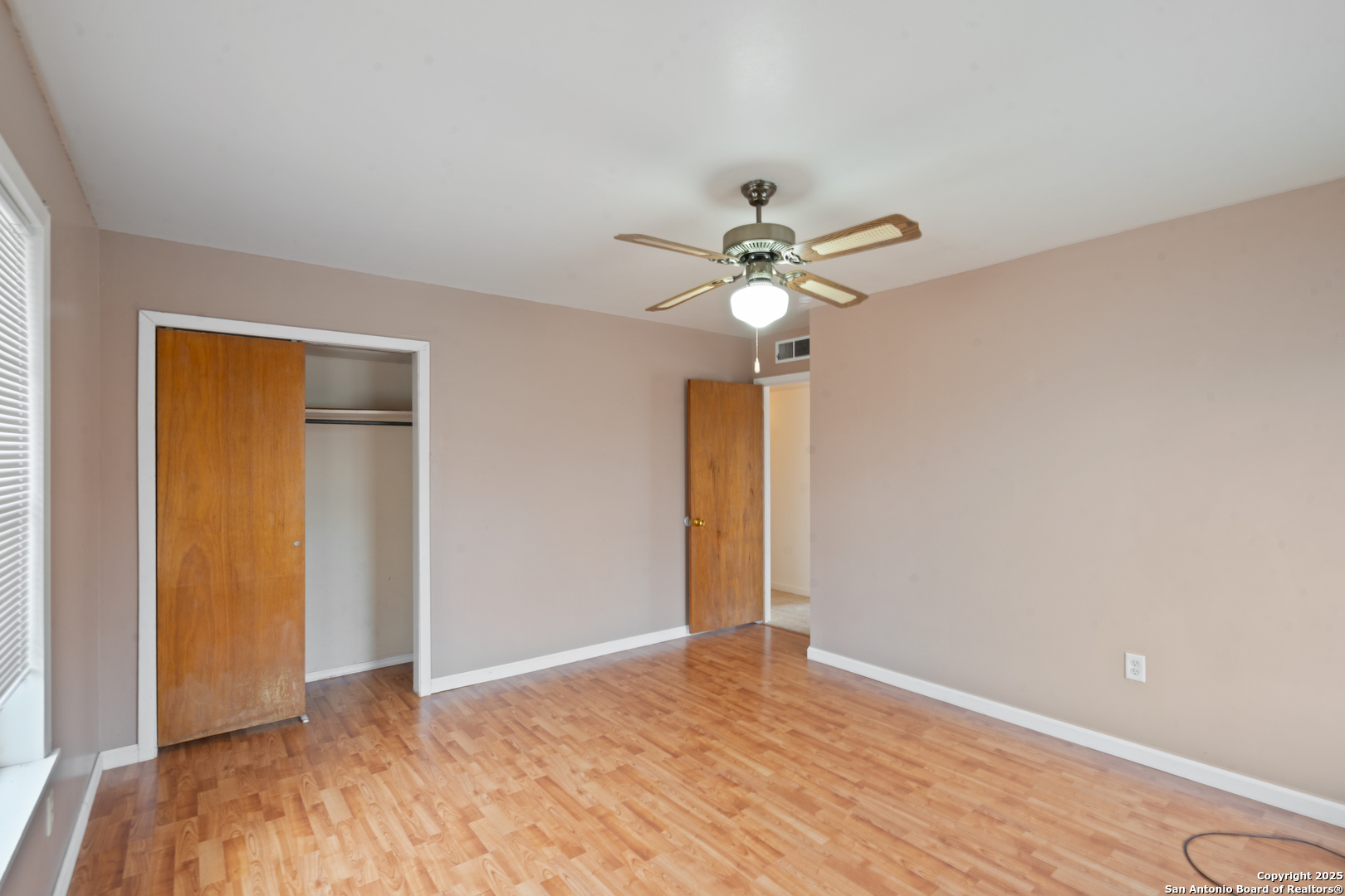 203 Margaret Lane Del Rio, TX 78840 - Photo 37 of 42 a view of an empty room with wooden floor