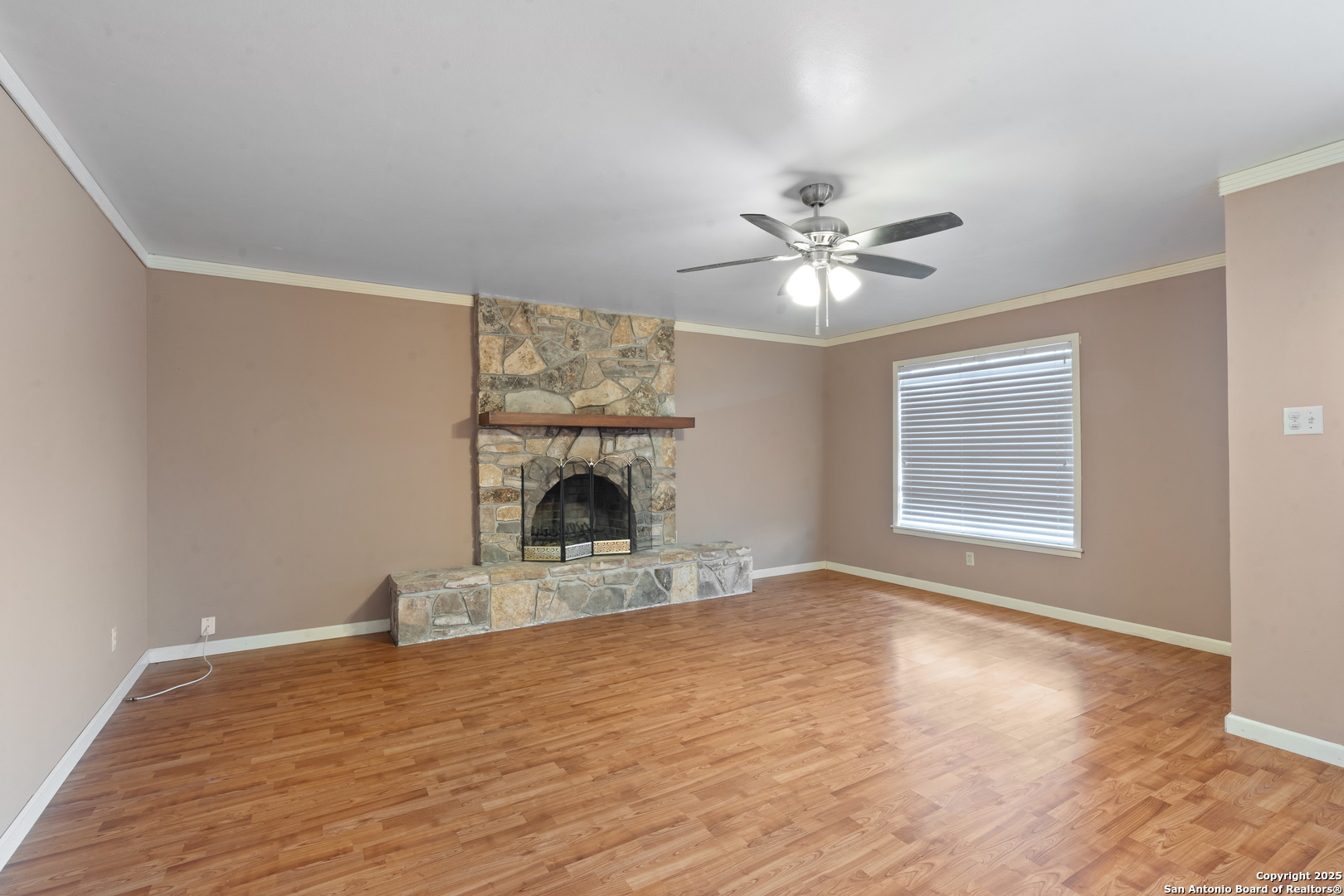 203 Margaret Lane Del Rio, TX 78840 - Photo 7 of 42 a view of empty room with fan and window