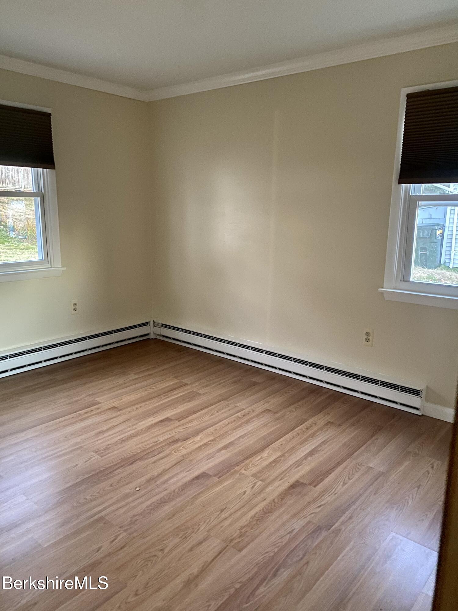 44 Eleanor Road Dalton, MA 01226 - Photo 22 of 36 a view of a room with wooden floor and white walls