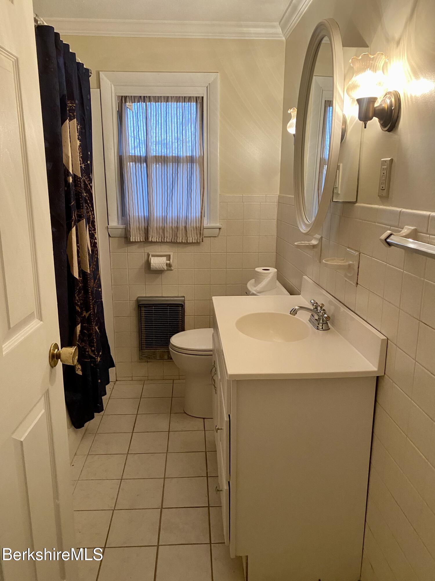 44 Eleanor Road Dalton, MA 01226 - Photo 24 of 36 a bathroom with a sink and a mirror