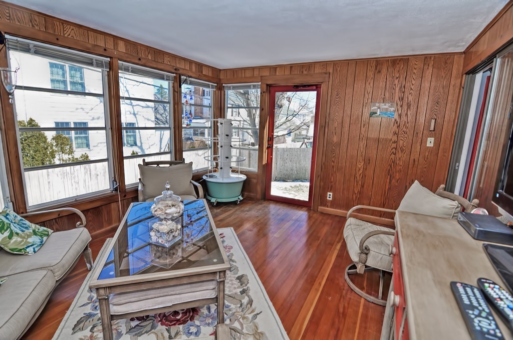 38 Shetland Road Marblehead, MA 01945 - Photo 18 of 23 a living room with furniture and a large window