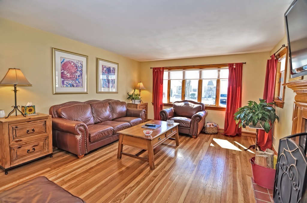 38 Shetland Road Marblehead, MA 01945 - Photo 4 of 23 a living room with furniture fireplace and a large window