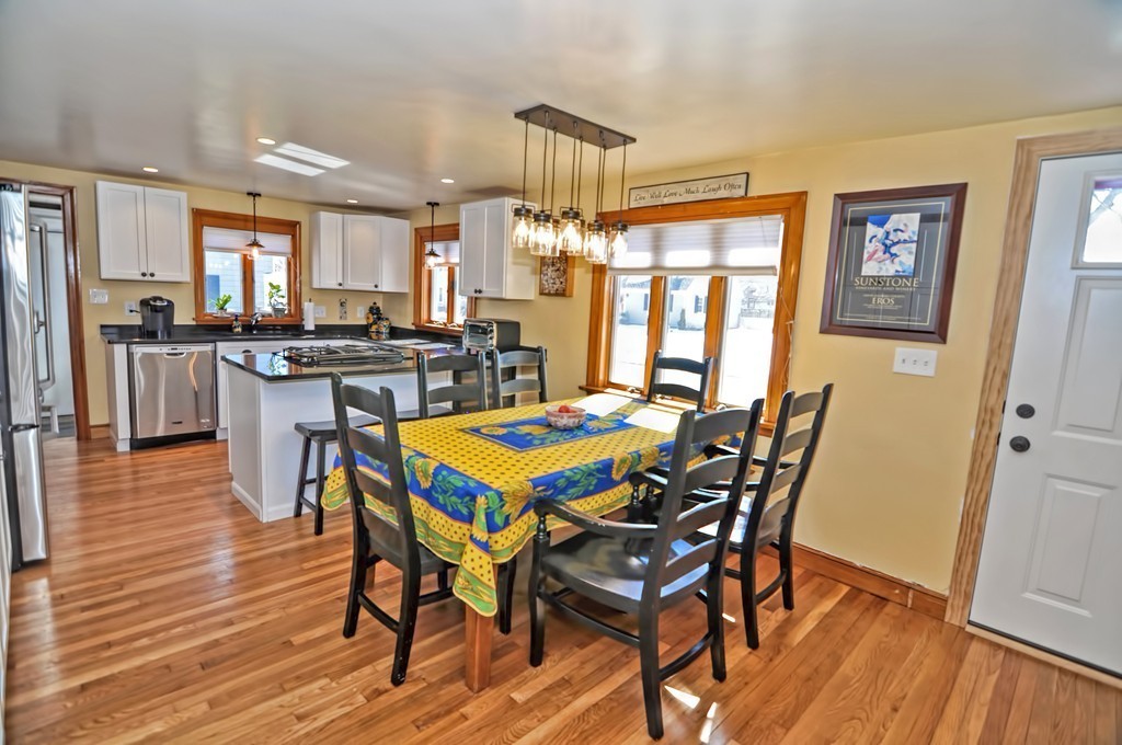 38 Shetland Road Marblehead, MA 01945 - Photo 7 of 23 a view of a dining room with furniture window and wooden floor