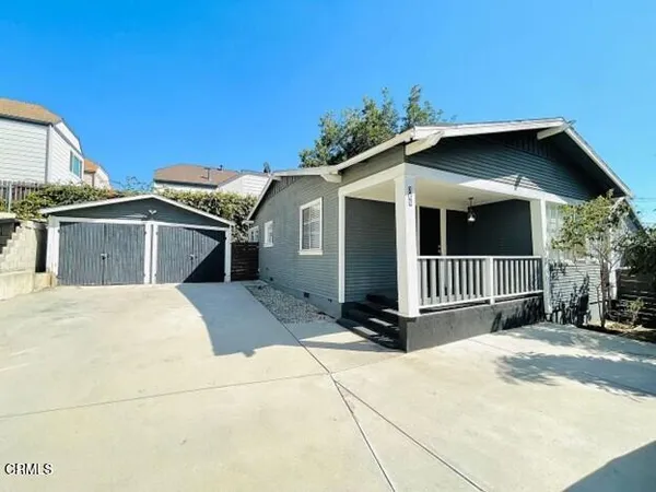 a front view of a house with a garage