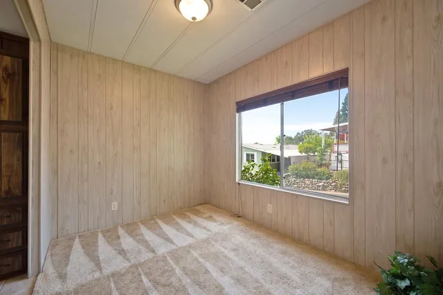 a view of a kitchen with a sink cabinets and a window