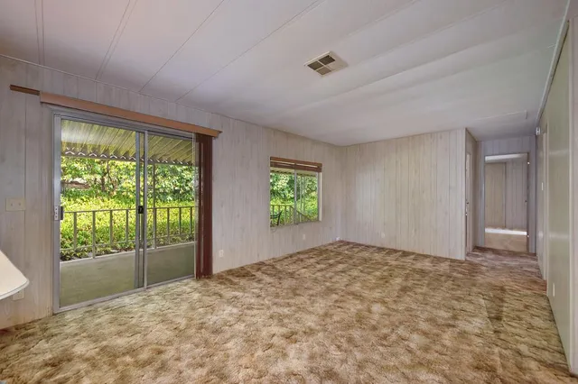 a view of a kitchen with a sink