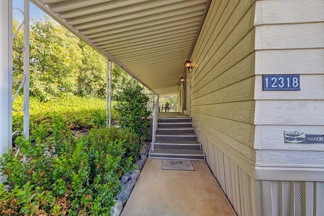 a balcony with chairs