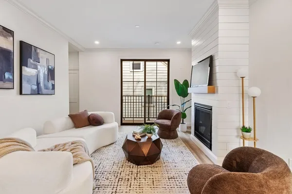 a living room with furniture or couch and a window