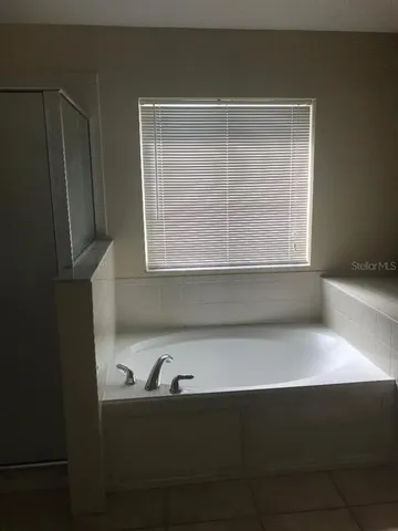 a view of kitchen and microwave