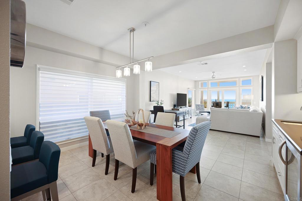 111 Sequoia Avenue, Unit C Carlsbad, CA 92008 - Photo 13 of 38 a view of a dining room with furniture