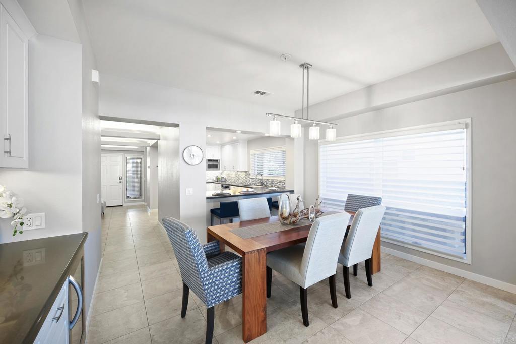 111 Sequoia Avenue, Unit C Carlsbad, CA 92008 - Photo 14 of 38 a view of a dining room with furniture