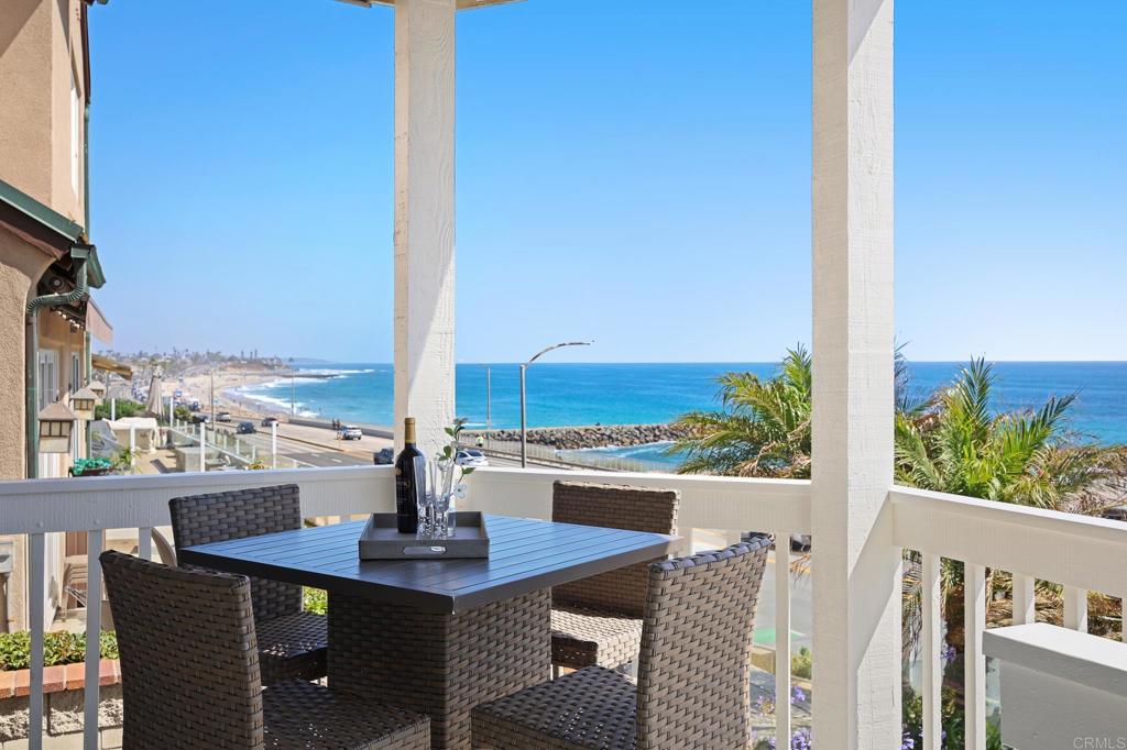 111 Sequoia Avenue, Unit C Carlsbad, CA 92008 - Photo 26 of 38 a view of balcony with table and chairs