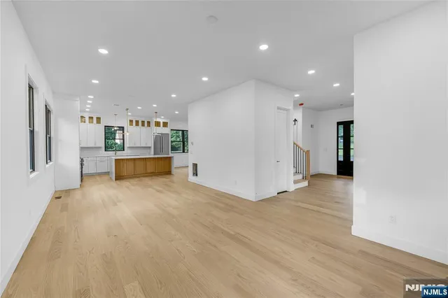 a view of a hallway with staircase