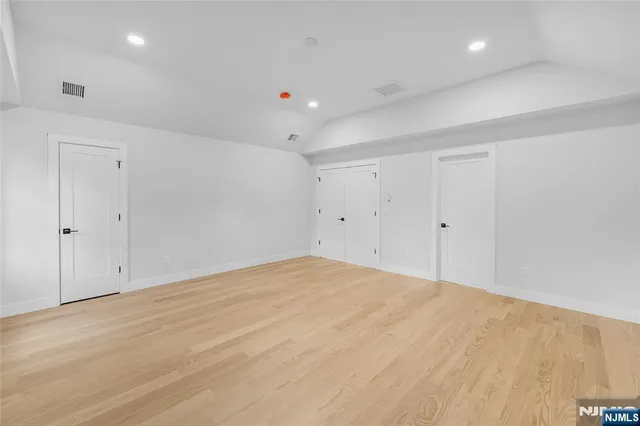 a bathroom with a tub and shower